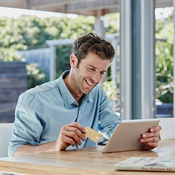 Man making purchase with credit card