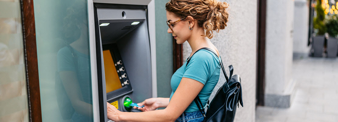 woman using ATM