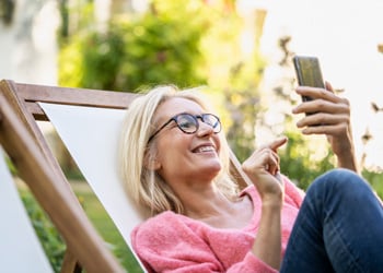 woman laughing on her phone