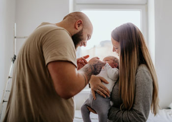 couple with new baby