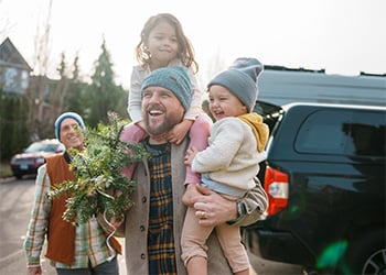 family shopping for Christmas tree