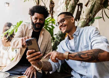 man sharing his phone screen