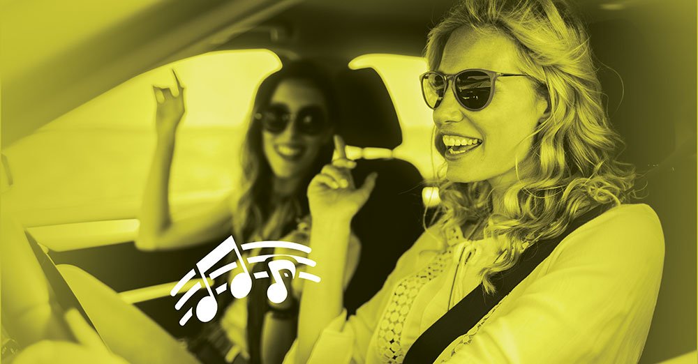 two girls riding in car