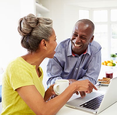 Man and woman at laptop