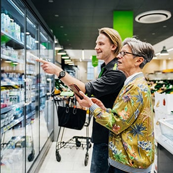 Senior and young man shopping