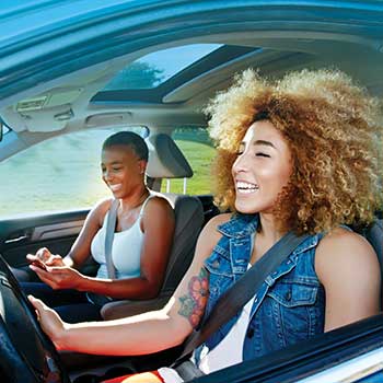 friends driving in car