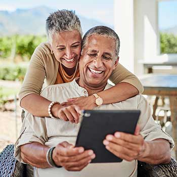 Couple looking at tablet