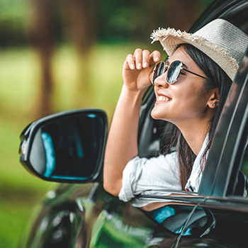 young woman in car