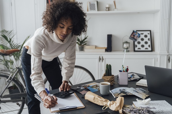 woman standing at desk