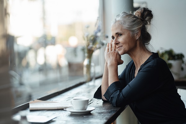 woman sitting alone on the sofa