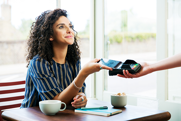 woman making mobile payment