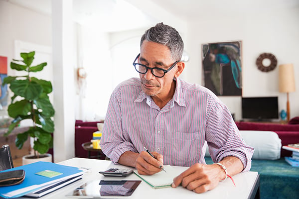 man looking over documents