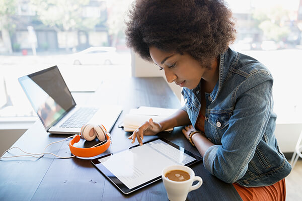 woman doing online banking on her laptop